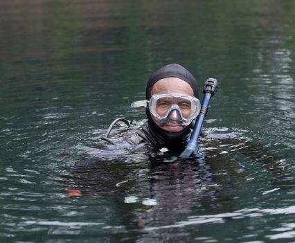 Kamau Sadiki, a dive instructor with Diving With a Purpose, takes a break from a session at Lake Phoenix, in Rawlings, Virginia, June 9, 2021.