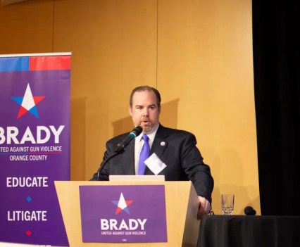 Stephen Lindley, a former state Justice Department official, gives a speech on firearm law implementation at the California Brady Conference in November of 2019