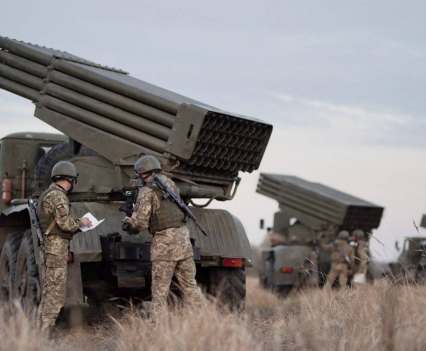 Ukrainian Armed Forces near BM-21 "Grad" multiple rocket launchers during tactical military exercises in the Kherson region, Ukraine, Jan. 19, 2022.
