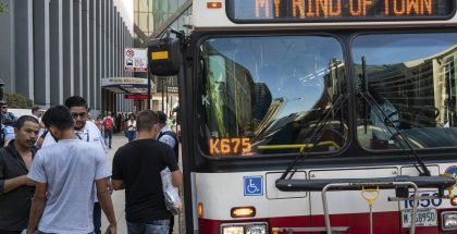 A CTA bus shuttle reads “My Kind of Town” as migrants disembarked a bus at Union Station after a 25-hour-long ride from Texas Sept. 9, 2022