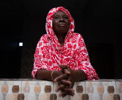 Serigne Mbaye’s mother, Dior Diouf, is a revered matriarch in Kayar, managing a six-bedroom house full of children and showing a gold tooth when she smiles.