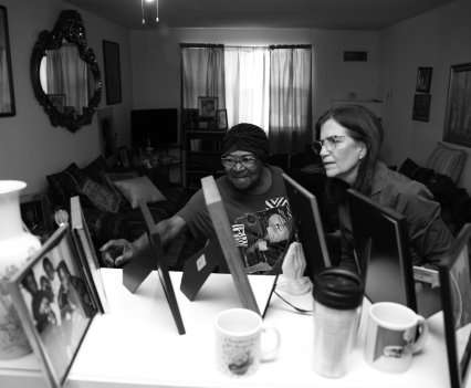 Earline Floyd (left) at her apartment in Jacksonville, Florida, describes the childhood of her son, James Bernard Belcher, to mitigation specialist Sara Baldwin, in June 2022.