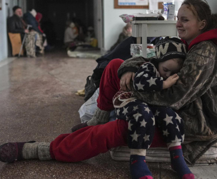 Woman and child crying in the Ukraine.