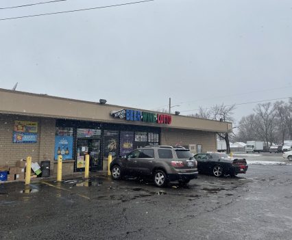 The Korner Party Store in Warren, Michigan, on April 18, 2022. Ashley Standifer bought scratch-off lottery tickets from the store in April. The store, which sold $1.7 million worth of lottery tickets in 2020, is located in the Van Dyke school district, where the majority of students are Black and/or qualify for free-or-reduced-price lunch, and also receive the minimum amount of per-pupil funding from the state. (Alexandra Macia/Howard Center for Investigative Journalism)