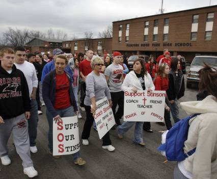 Members of the school and community rallied behind Pleasure Ridge Park football coach Jason Stinson following a grand jury indicting him on a charge of reckless homicide in the 2008 death of Max Gilpin. The community held vigils and walked the streets holding signs in support of the coach. Stinson was acquitted at trial.