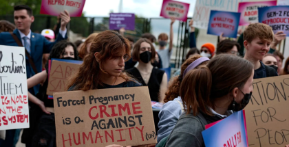 Abortion rights activists attend a rally in front of the Supreme Court building On May 5, 2022 in Washington, D.C.