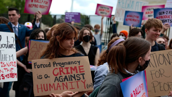 Abortion rights activists attend a rally in front of the Supreme Court building On May 5, 2022 in Washington, D.C.