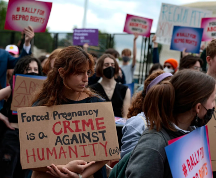 Abortion rights activists attend a rally in front of the Supreme Court building On May 5, 2022 in Washington, D.C.