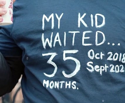 PROTEST: The parent of a transgender child demonstrates in London. The average wait for gender care on the NHS is nearly three years. REUTERS/Natalie Thomas