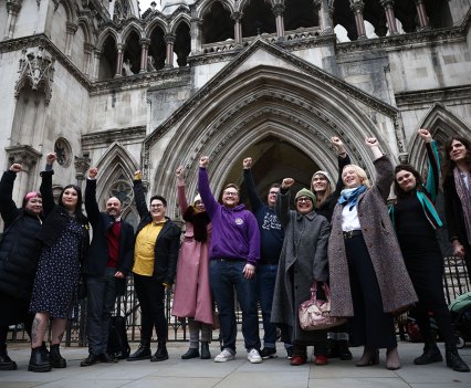 LEGAL ACTION: Transgender care advocates outside London’s Royal Courts of Justice in November 2022. They want the court to rule that long waiting times for gender care are unlawful. REUTERS/Henry Nicholls