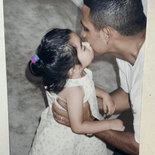 Victoria Valenzuela and her father.